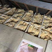 View from inside the new loft space, showing the access hatch and insulation. View from inside the new loft space, showing the access hatch and insulation.