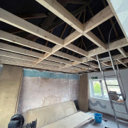View showing the new ceiling structure being built along with loft space access. View showing the new ceiling structure being built along with loft space access.