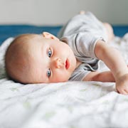 The position a newborn baby prefers to face may be an indicator of whether they'll be left- or right-handed.